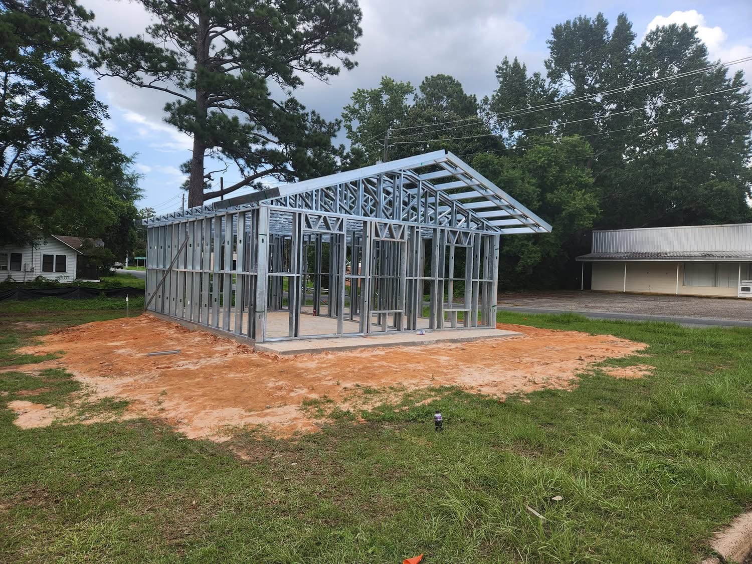 Steel barndominium frame with pitched roof in Florida