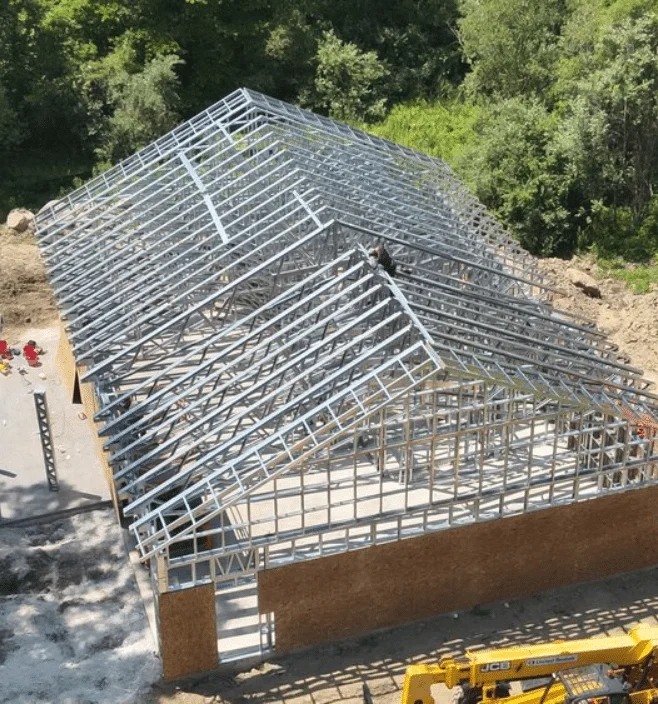 Aerial view of steel frame barndominium construction in Florida